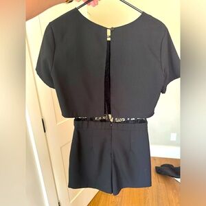 Black romper with lace insert